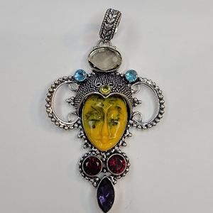 Sterling Silver Pendant with Yellow Carved Face and Multi-Gem Accents